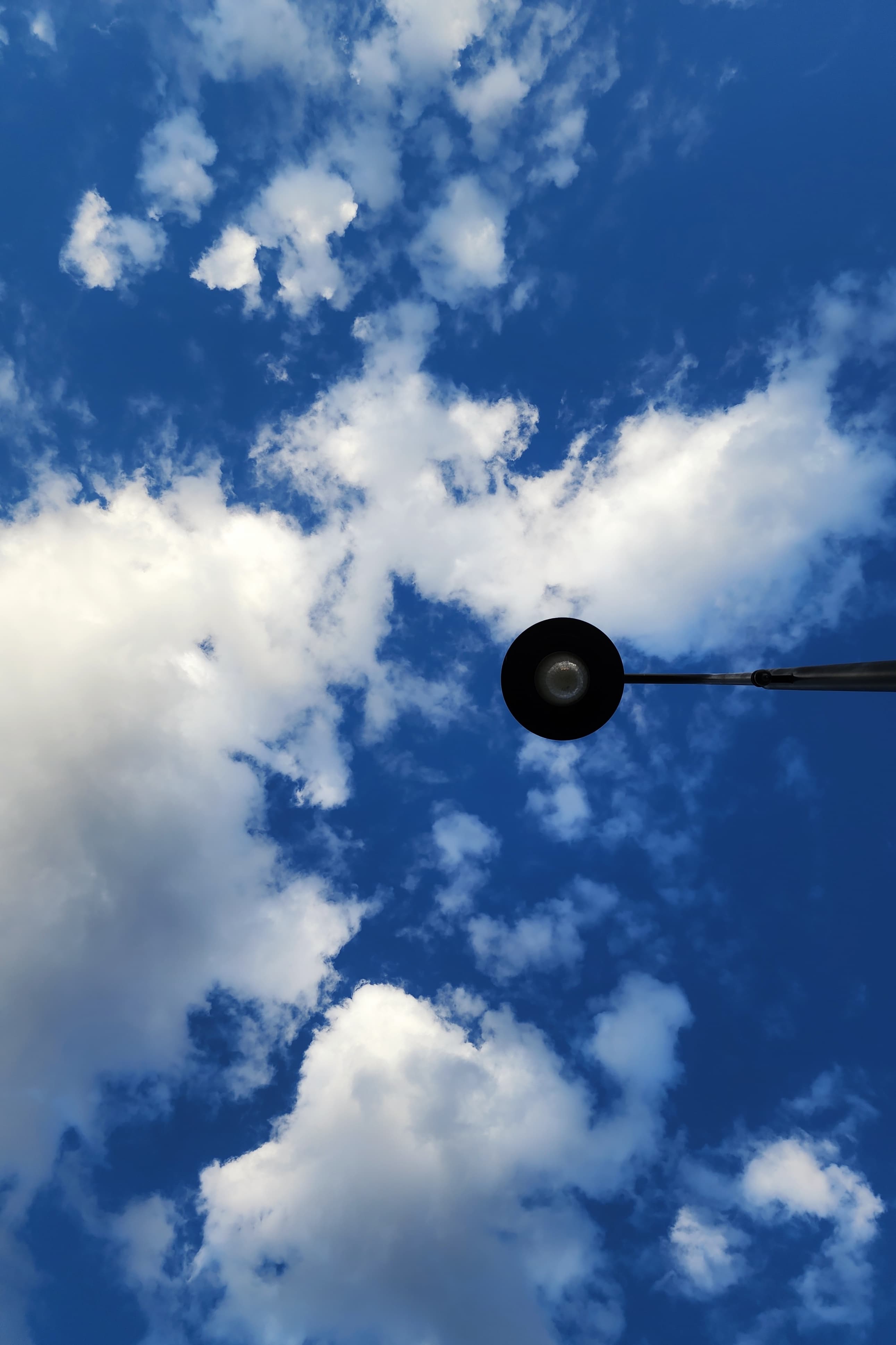 A lamp silhouetted against the sky