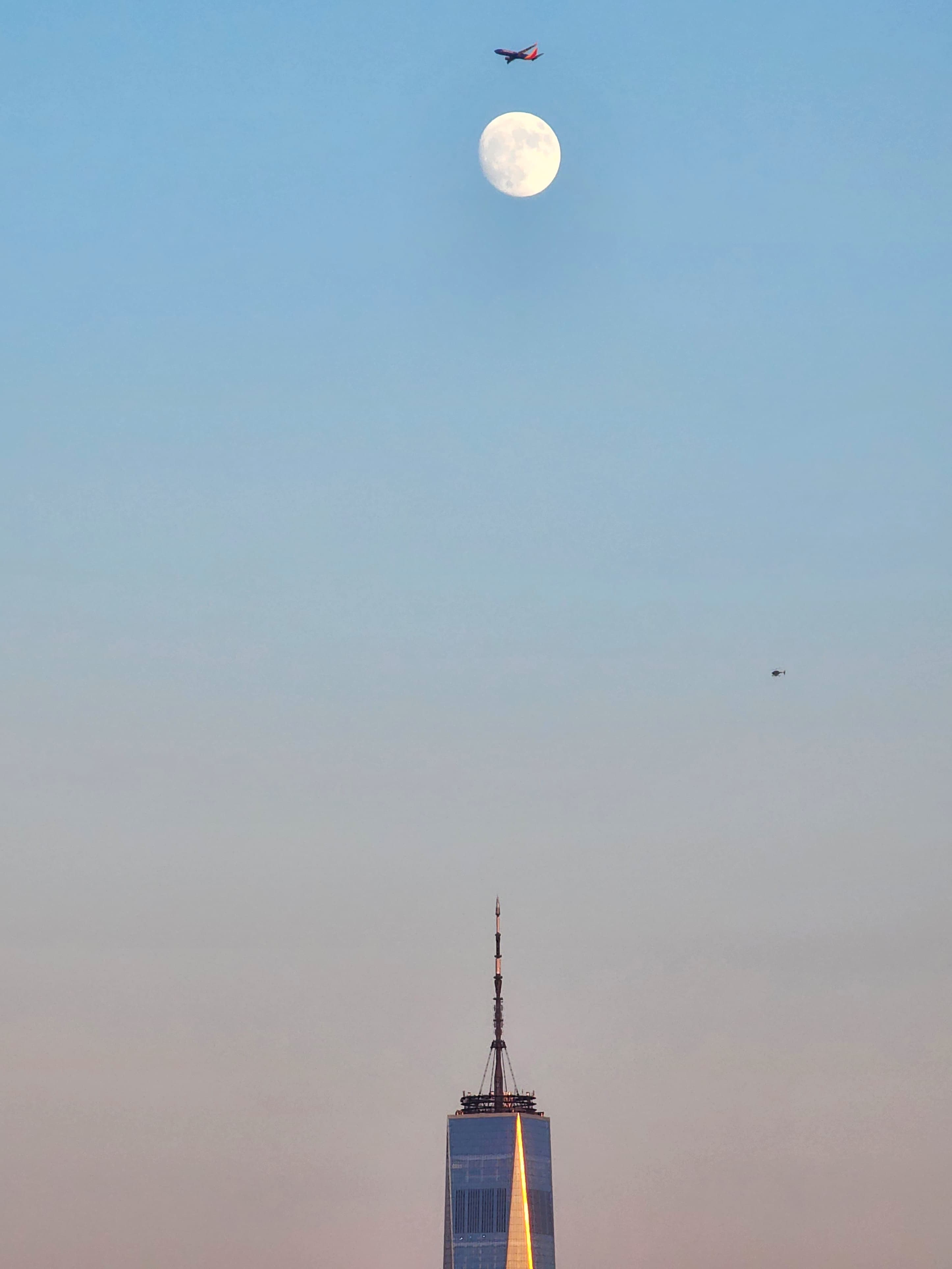 World Trade Center with the moon exactly above it